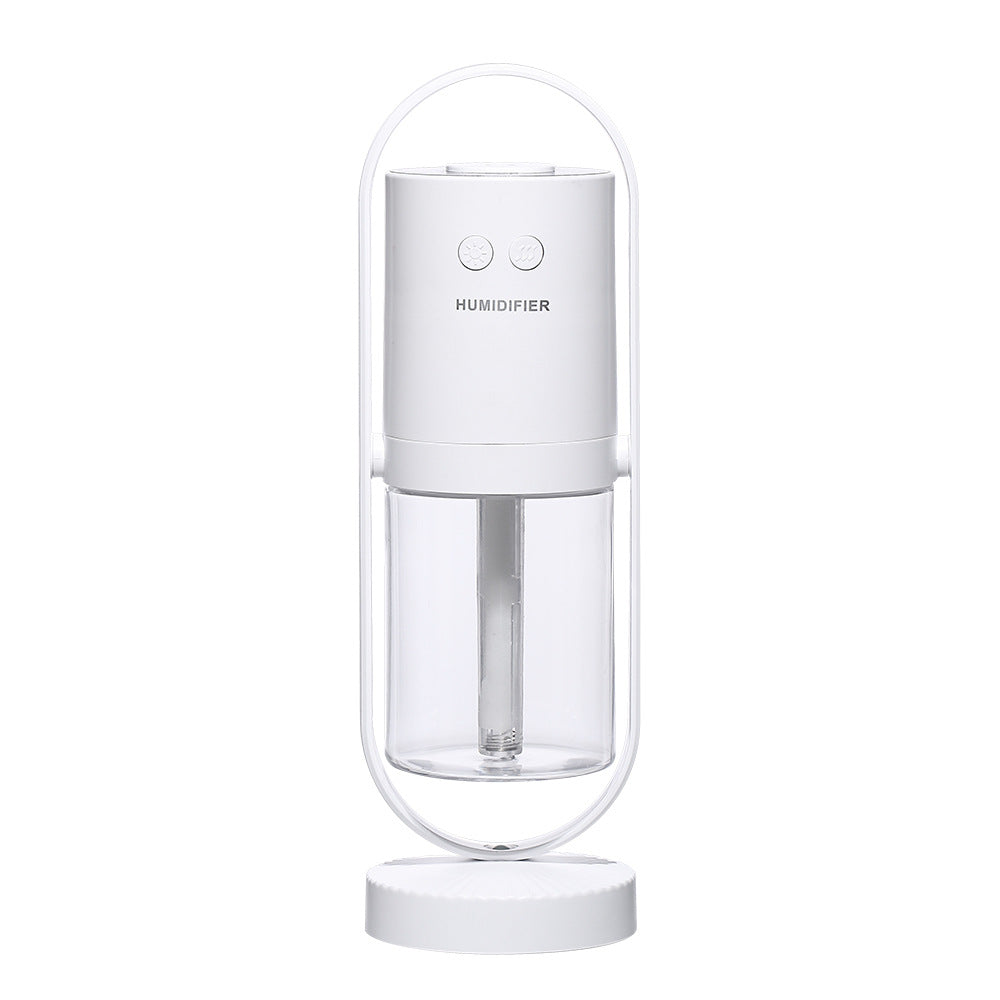 Magic Shadow mini air humidifier shown in pink, white, and dark blue colors