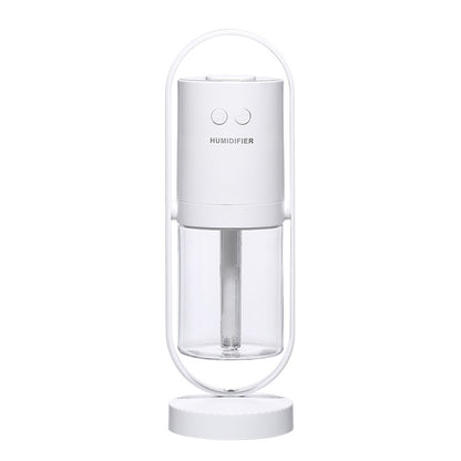 Magic Shadow mini air humidifier shown in pink, white, and dark blue colors