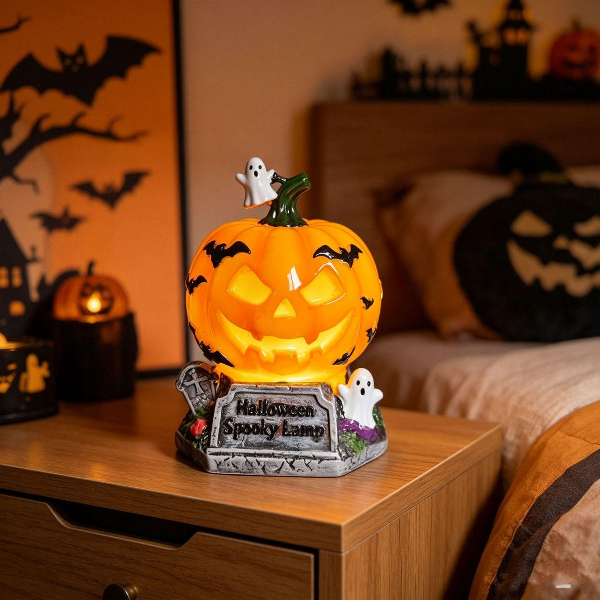 Halloween themed table lamps featuring skull, crying ghost, and skeleton designs on a desk.