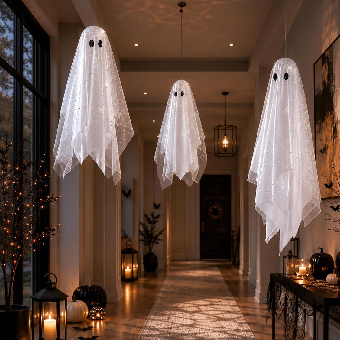 A picture of three assembled sequined mesh hanging ghosts with internal lights turned on, emitting a warm yellow glow. Below the ghosts, feature icons explain the lights are Waterproof, include a 6-hour on / 18-hour off timer, and have 8 lighting modes with a remote control.
