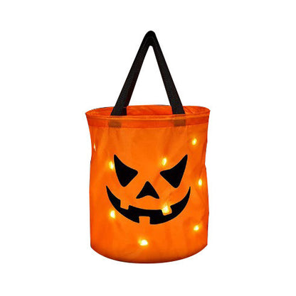 LED Light-up Halloween Pumpkin bucket bag for kids trick or treating, in orange polyester material.
