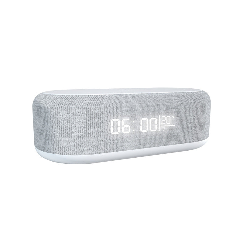 Infrared graphic presentation of the white wireless charger alarm clock, showing the built-in wireless charging pad for smartphones, ABS plastic & fabric finish, dual alarm & temperature display, USB powered, dimmable base light with 3 brightness levels, and dimensions callouts.